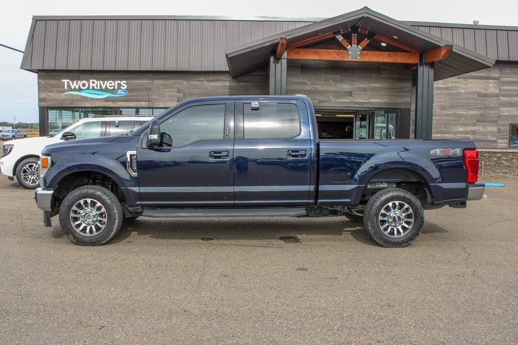 2022 Ford F-250SD Lariat in Antimatter Blue Metallic — front three-quarter view