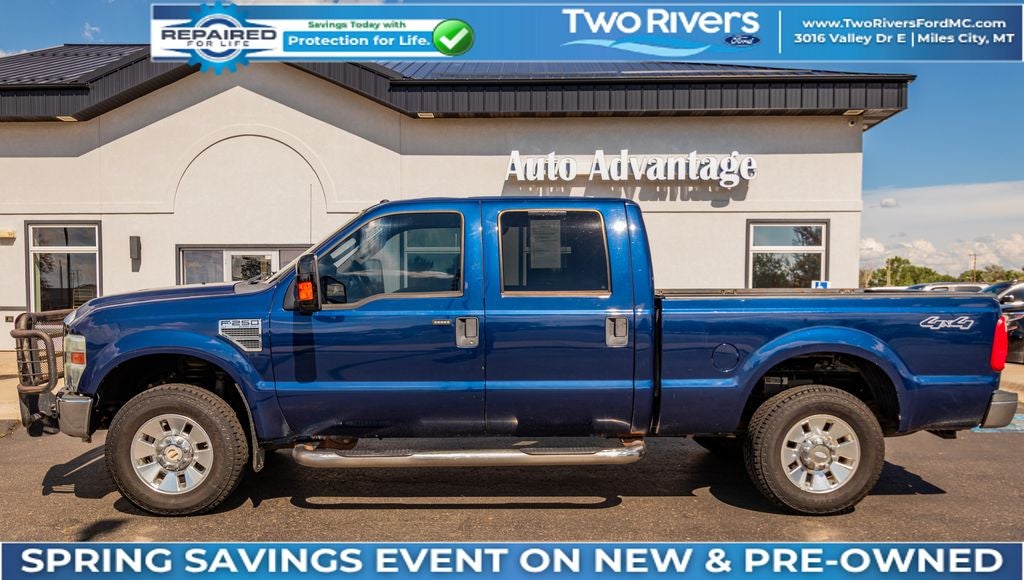 2008 Ford F-250SD XLT in Dark Blue Pearl Clearcoat Metallic — front three-quarter view