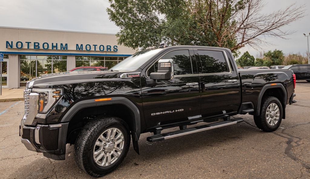 2024 GMC Sierra 3500HD Denali in Onyx Black — front three-quarter view