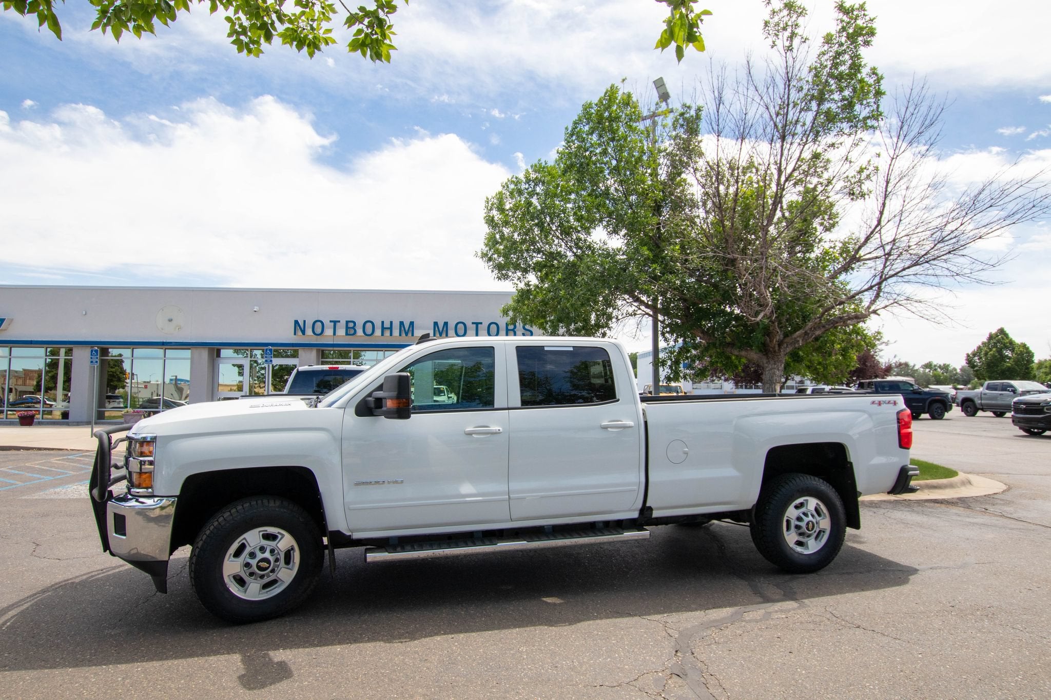 2017 Chevrolet Silverado 2500 HD LT in Summit White — front three-quarter view