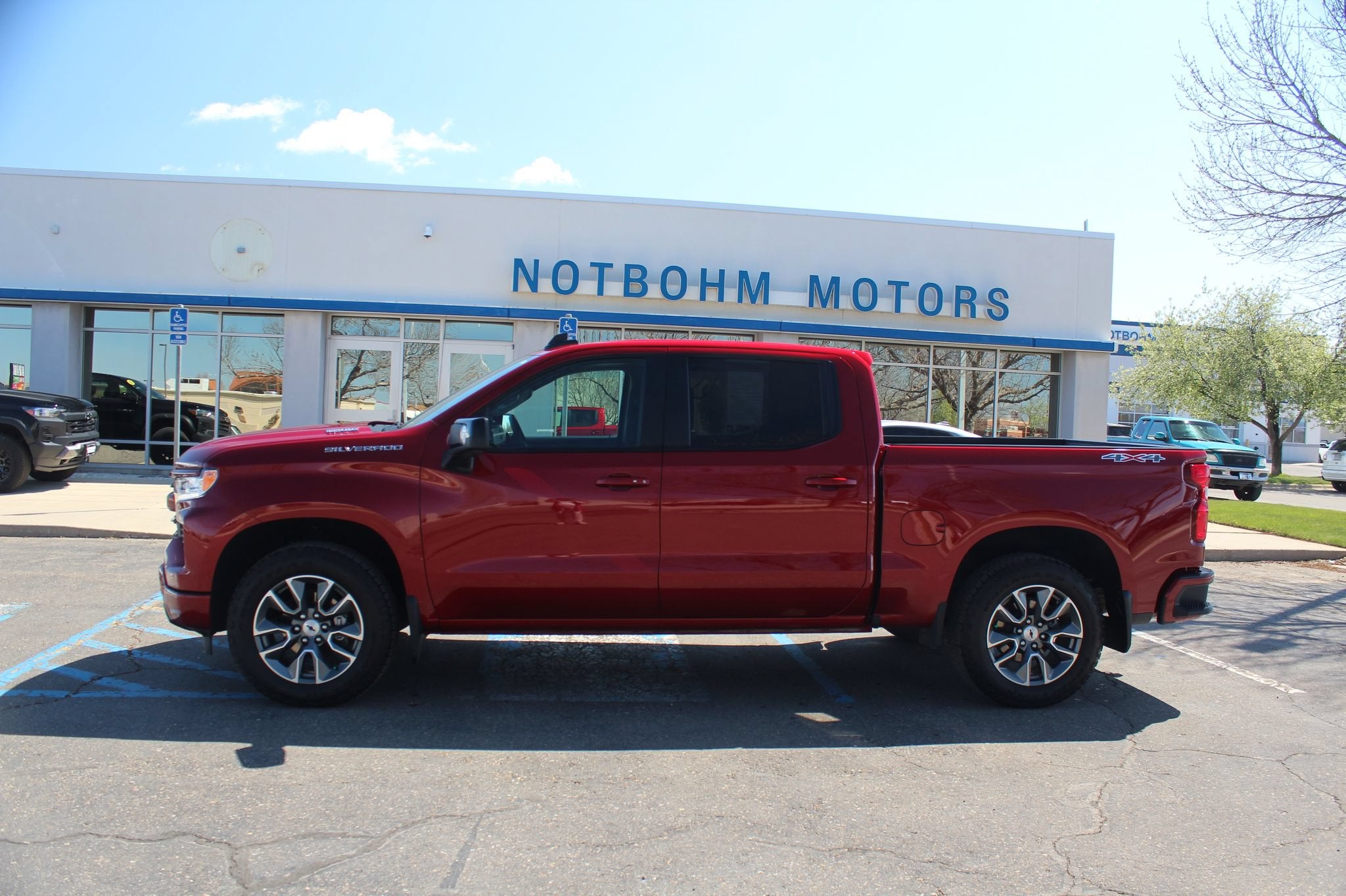 2025 Chevrolet Silverado 1500 RST in Radiant Red Tintcoat — front three-quarter view