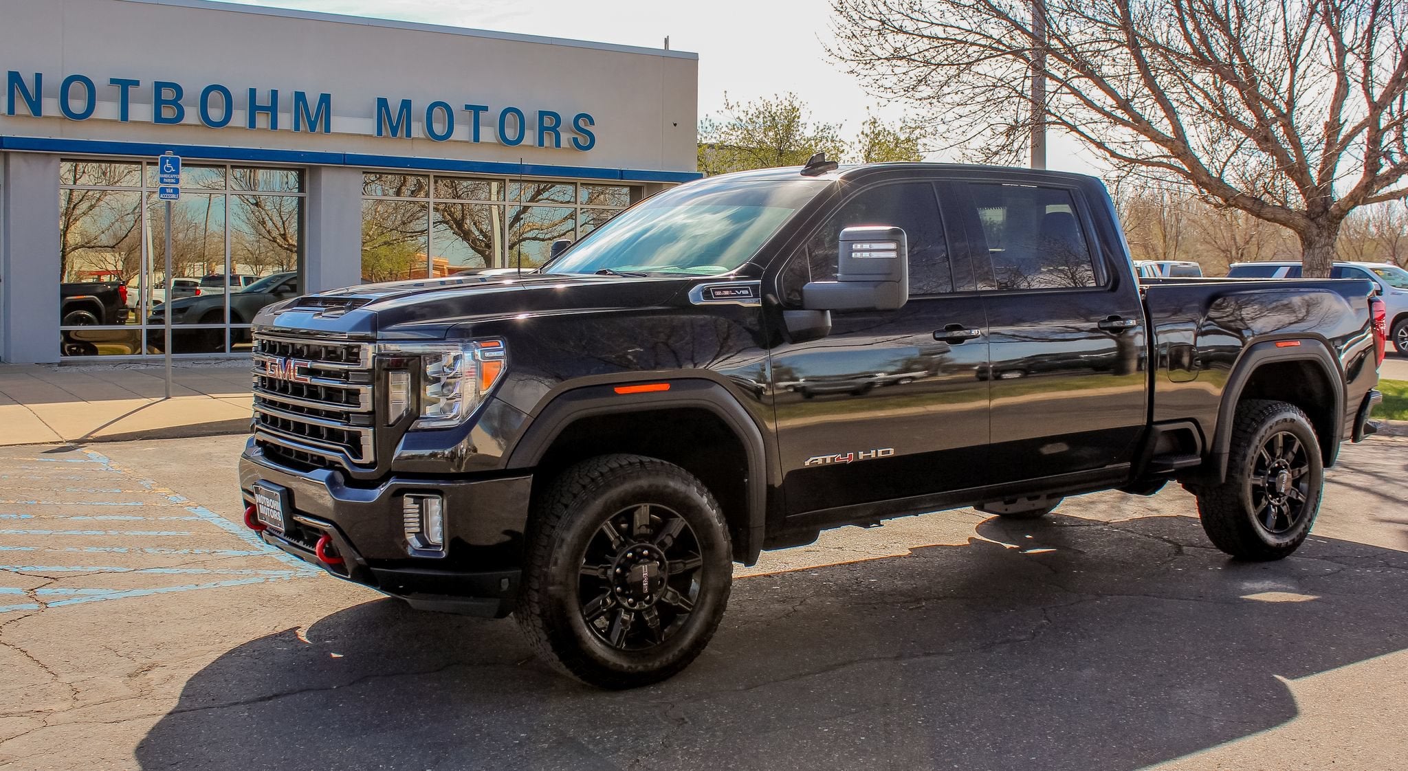 2020 GMC Sierra 2500 HD AT4 in Onyx Black — front three-quarter view