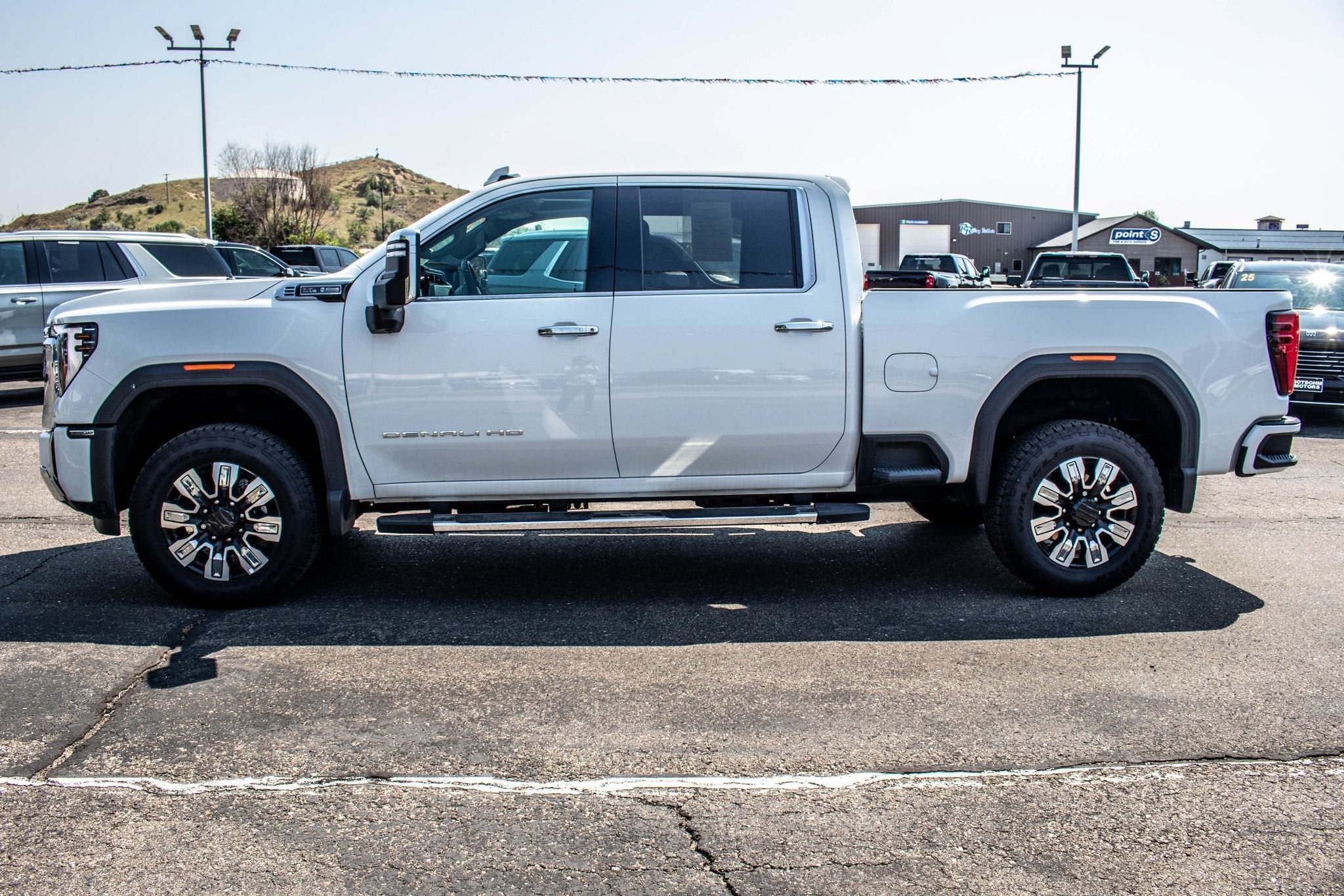 2024 GMC Sierra 3500 HD Denali in Summit White — front three-quarter view