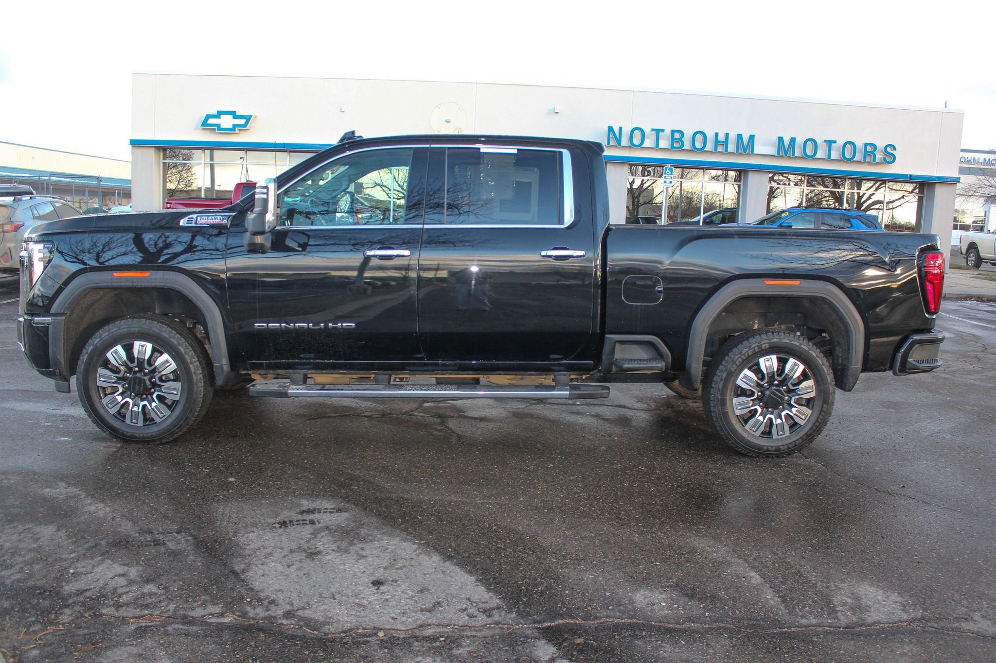 2024 GMC Sierra 3500 HD Denali in Onyx Black — front three-quarter view