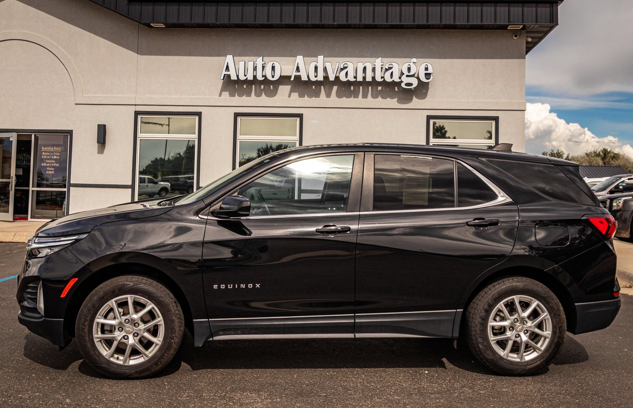 2024 Chevrolet Equinox LT in Mosaic Black Metallic — front three-quarter view